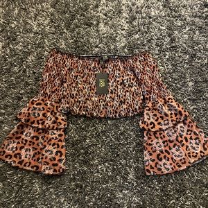 Size L cheetah print crop top from cavendars, never worn.